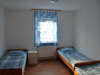 Schlafzimmer mit Einzelbetten - Unterkunft + Laubach